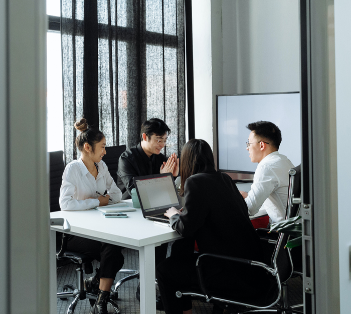 business person giving speech on business meeting
