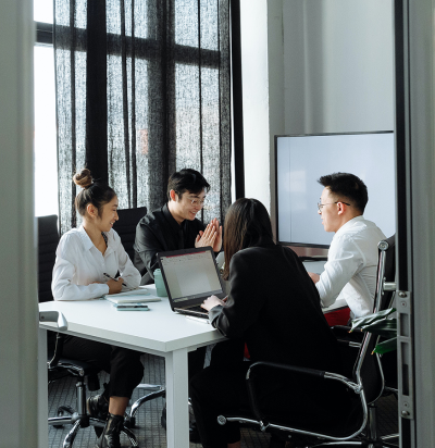 business person giving speech on business meeting