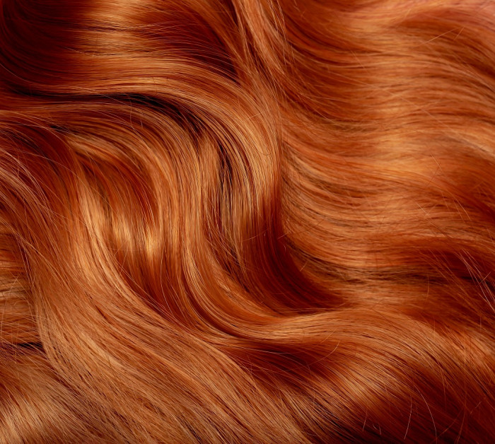 red hair close background womens long