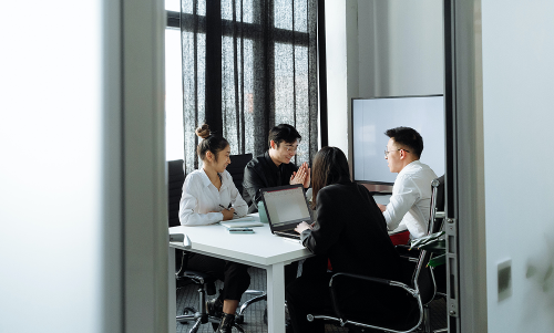 business person giving speech on business meeting ML1