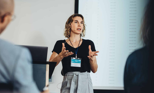 businesswoman delivering speech during conference ML1 v2