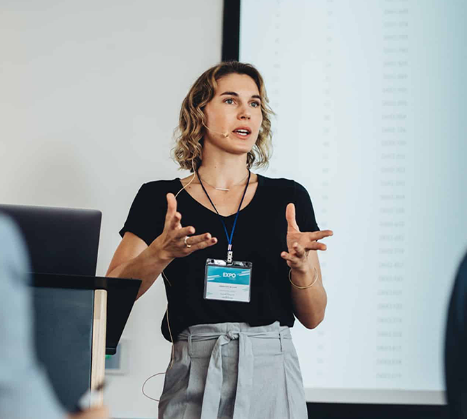 businesswoman delivering speech during conference ML1 v2