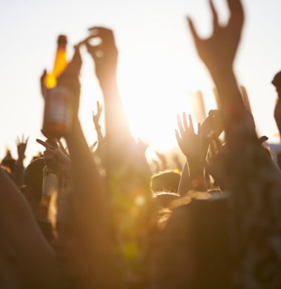 crowds enjoying themselves outdoor music festival