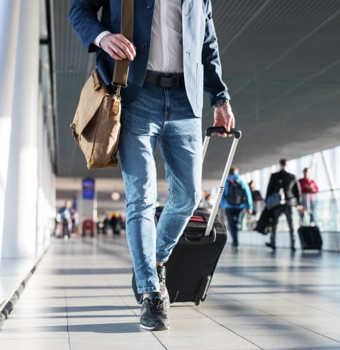 man shoulder bag hand luggage walking