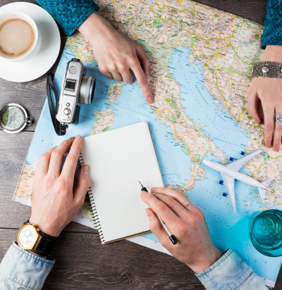 two young people together planning trip