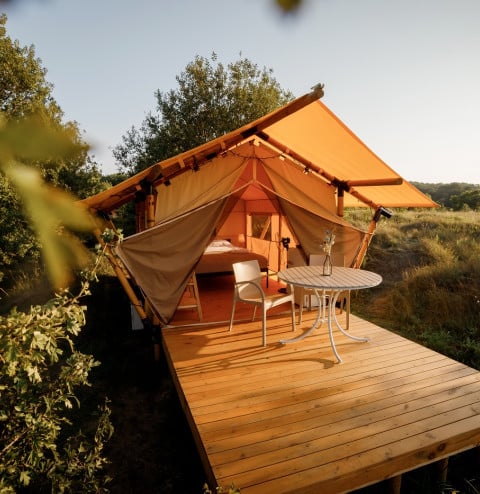cozy open glamping tent light inside