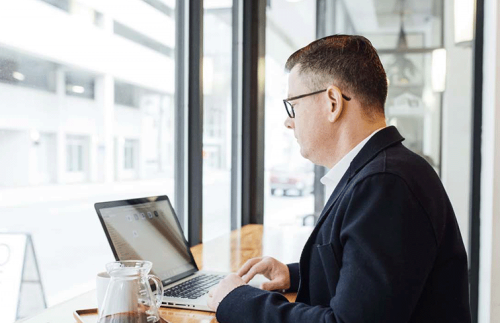 financial services man laptop SL3 v2