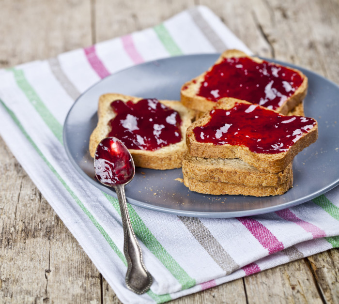 fresh toasted cereal bread slices on rustic wooden table