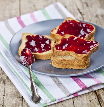 fresh toasted cereal bread slices on rustic wooden table