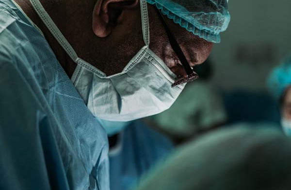 group healthcare workers businessman using laptop