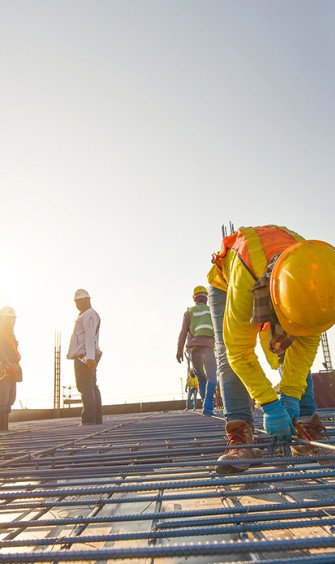 Construction workers steel reinforcement bar  shutterstock 786092152 v2