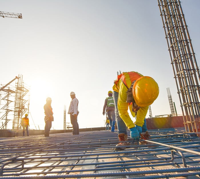 Construction workers steel reinforcement bar  shutterstock 786092152 v2