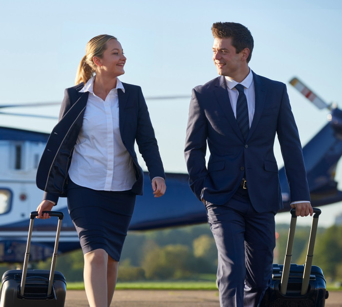 businesswoman businessman discussion helicopter