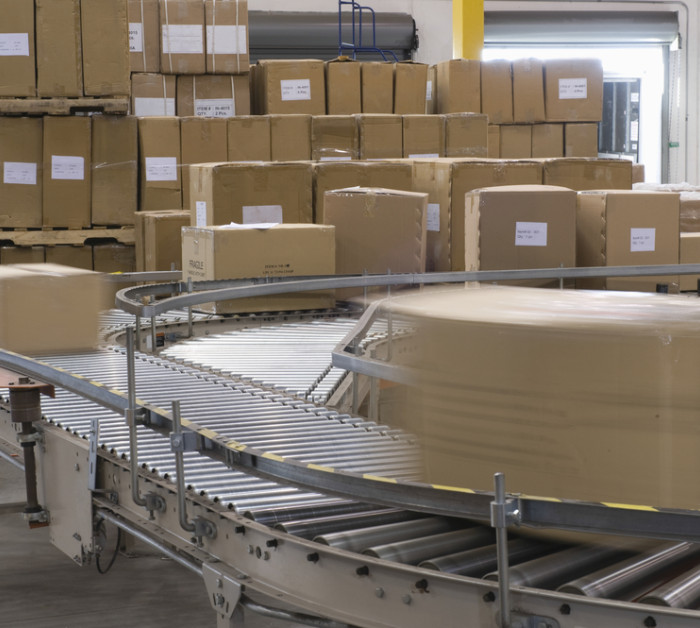 cardboard boxes on conveyor belt distribution