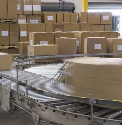 cardboard boxes on conveyor belt distribution