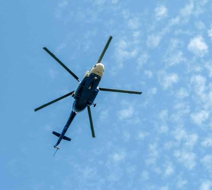 helicopter flight against blue sky