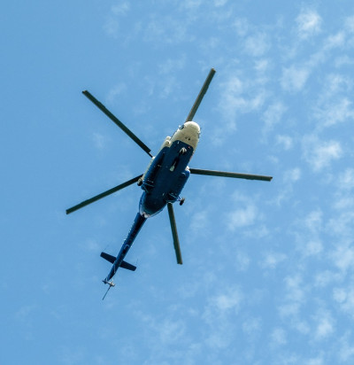 helicopter flight against blue sky