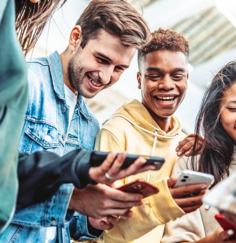 diverse group young people using smart phone