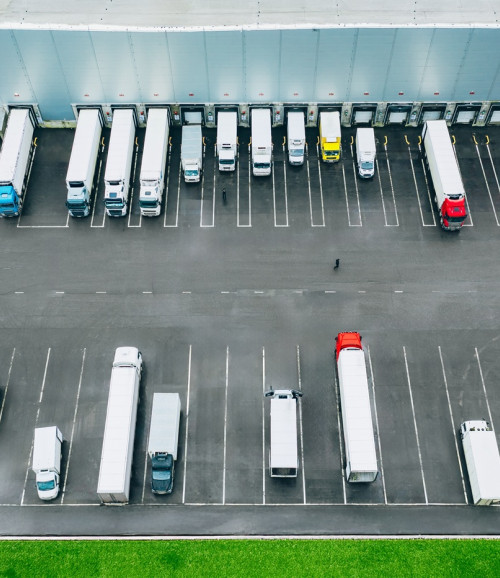 aerial view different logistic trucks loading