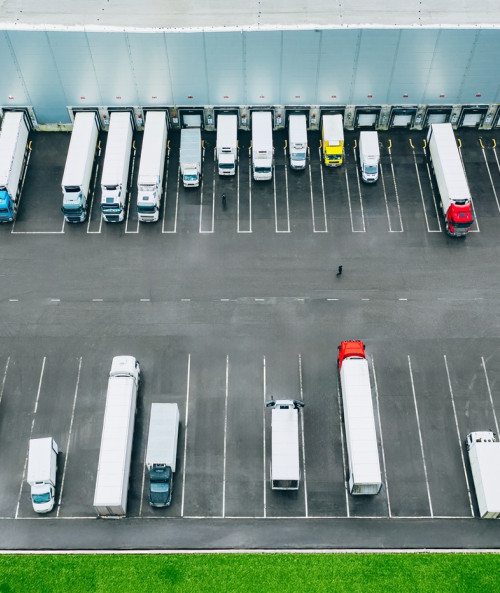 aerial view different logistic trucks loading