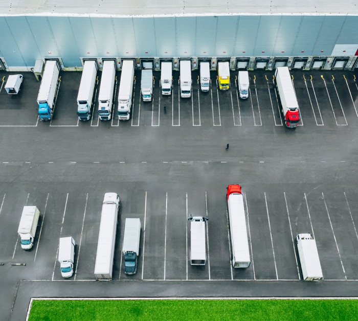 aerial view different logistic trucks loading