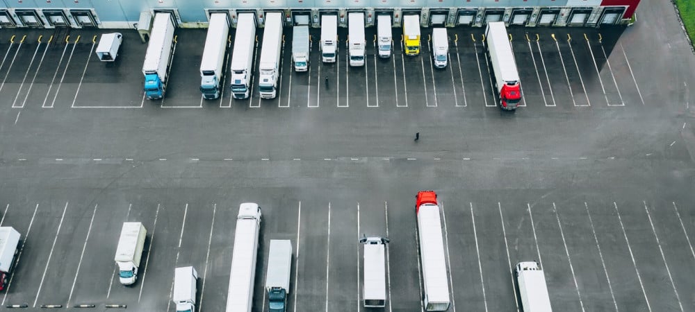 aerial view different logistic trucks loading