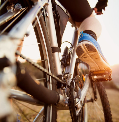 detail cyclist man feet riding mountain