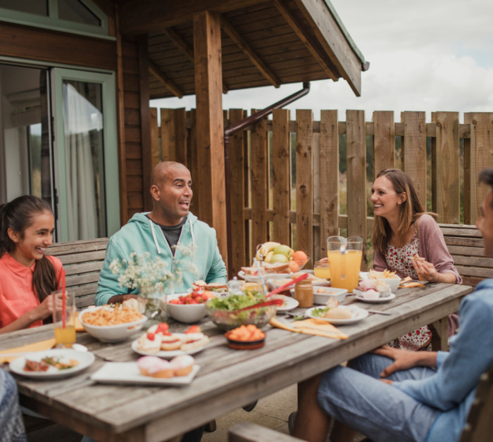 family bonding laughing sitting having breakfast