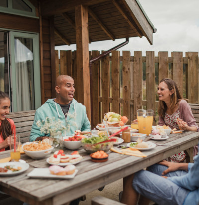 family bonding laughing sitting having breakfast