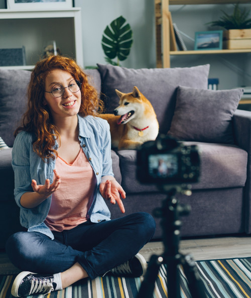 happy-girl-creative-vlogger-recording-video