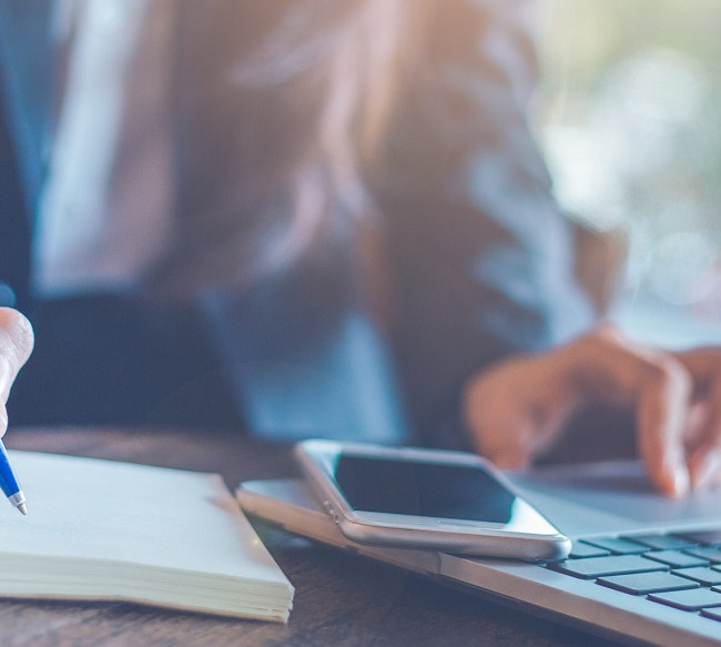 insurance laptop notepad