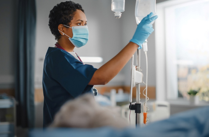 doctor working on laptop computer tablet