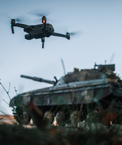 drone flying above tank background nature