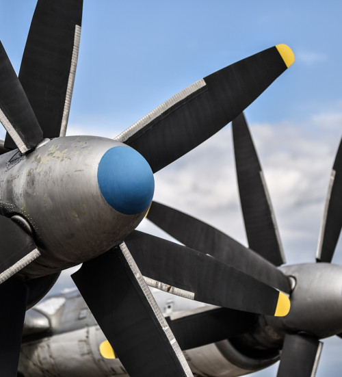 Modern military fighter jet on the runway at an air base.