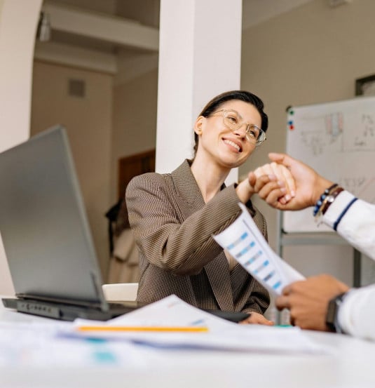 business handshake in a modern office meeting